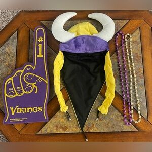 Vikings foam finger, Vikings hat, and Vikings purple and gold necklaces.